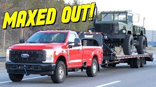 Ford F-250 Powerstroke Takes On The World's Toughest Towing Test Pulling a Military Truck!