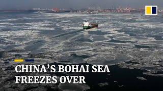 Ice covers China's Bohai Sea as temperatures drop sharply in northeastern region