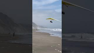 World class stunning hanggliding performance in California coast line by Avi