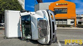 Speeding or Near Miss? Box Trucks Flips Over