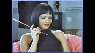 Nadja smoking with a cigarette holder short black wig