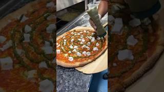 The TIKKA PIZZA in the making from Tony Boloney’s in Hoboken, NJ!  #DEVOURPOWER