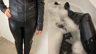 Girl taking a fully clothed bath in leather jacket, leather leggings and high heel boots Wam Wet