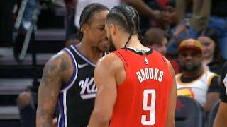 DeMar DeRozan and Dillon Brooks get heated in each others face then Brooks shoves DeMar 