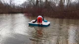 Tyler Clifford helps launch a boat