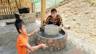 The process of mother and son building a wood stove and chicken coop. with cement - farm building