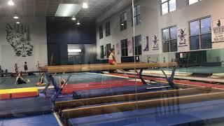 Lobo gymnastics practice silver beam