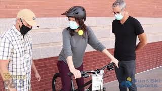 Hawkeye takes his wife shopping for a bike at Sun & Ski Sports!