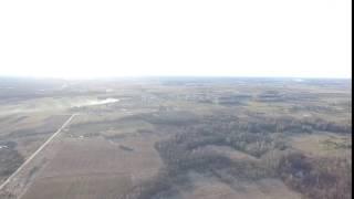 Panorama Over Landscape Near Little Town With Rotation - cutestockfootage.com