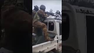 Papua New Guinea Defence Force shooting machine gun from Toyota Utility vehicle #army #gunfight #war