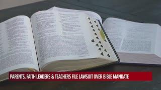 Parents, faith leaders & teachers file lawsuit over Bible mandate