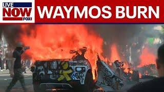 Cars go up in flames as anti-ICE protests, clashes with authorities continue in downtown Los Angeles