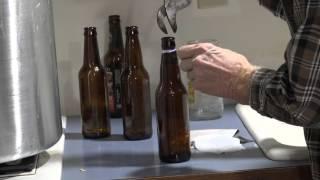 Removing labels from beer bottles