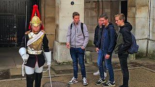 WE DON'T SPEAK ENGLISH. GERMAN STUDENTS GET FAR TOO CLOSE TO THE GUARD at Horse Guards!