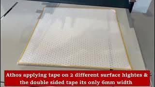 Athos Tape machine apply double sided tape on plastic materials with two different surface heights