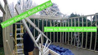 One man DIY Double Timber Garage Build part 6 - installing the roof trusses single handed.