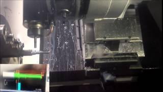 OKUMA Genos L300E-MY machining using Y axis milling