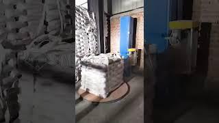 Pallet wrapping machine wraps bagged cement safely and quickly.#wrapping #film #machine #pallet