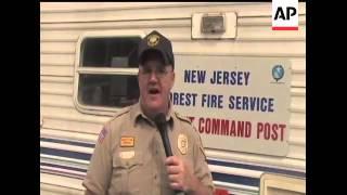 Firefighters in southern New Jersey continue to make progress in battling brush fires and wildfires