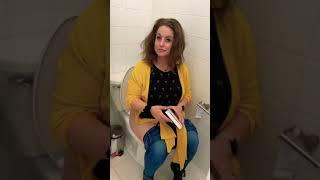 Girl pooping on display toilet 