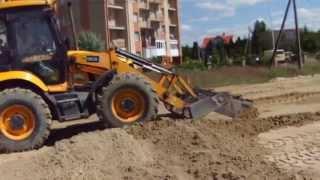 Выравнивание площадки под автостоянку трактором JCB - steh39.ru