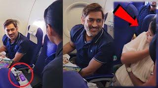 Watch MS Dhoni & Sakshi Amazing Reaction When Air Hostess Offers Chocolates To Him In Flight