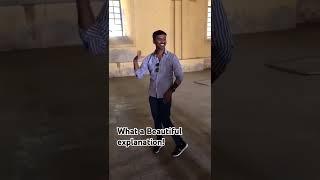 An Indian guide at a tourist spot explaining to foreigners about Bharatnatyam.What a skill Hats off