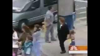 People walk by as child is abducted