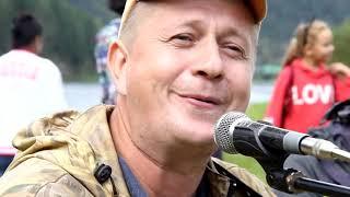 Siberian fishermens sing a song by the Mana river