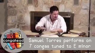 Samuel Torres performs on 7 congas tuned to E minor