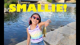 Lana fishes at the dam and catches 2 smallmouth and a bunch of green sunfish