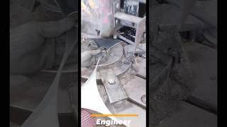 These Dazzling Small Metal Rings Masterfully Shear Through Waste Metal Sheets