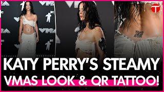 Katy Perry stuns with wet look and QR tattoo at VMAs