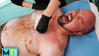 Men Try Painful Chest Waxing