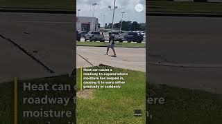 Car catches air as road buckles in Missouri heatwave #Shorts