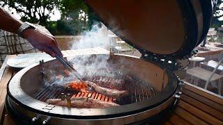 Grilling a pork shoulder with aubergine caviar and grilled peppers sauce on the Monolith Kamado BBQ