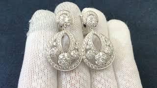 Platinum, Diamond Snowflake earrings, large model#fashiontrends #platinum #snowflakes #modeling