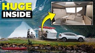 Sleek Toy-hauler Camping Trailer Hiding Secret Bathroom.