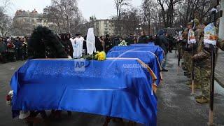 Funerals of 2 families and 3 children killed in Russian missile attack on Poltava