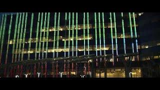 Las Vegas City Hall lit up in crimson and gold