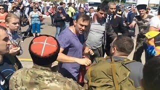 Russian opposition leader Navalny attacked by Cossacks