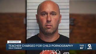 Docs: PE teacher charged with child porn, arrested at hotel with nude child