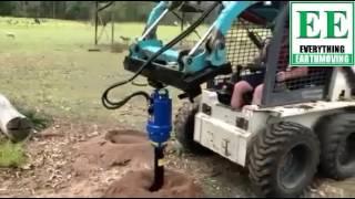 Auger Torque 4500MAX Earth Drill on Toyota Huski skidsteer.