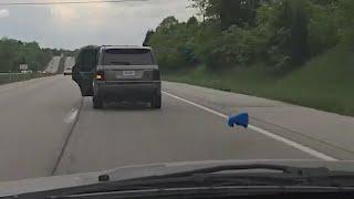 Kansas City drivers dodge objects tossed out of moving car on highway