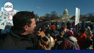 Demonstrators protest mass government layoffs outside of US Capitol