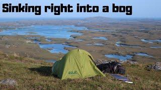 Trying find the route along peat bogs and then sinking right into a bog. The Hebridean Way. Scotland