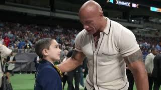 Mariachi Mateo Lopez with Dwayne “THE ROCK” Johnson at the XFL championship game San Antonio Texas