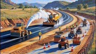 Road construction site on rural national road, with large paving machine laying asphalt on the road