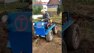 Самодельный бортоповоротный трактор пашет огород. Homemade tractor