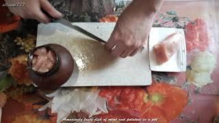 Amazingly tasty dish of meat and potatoes in a pot